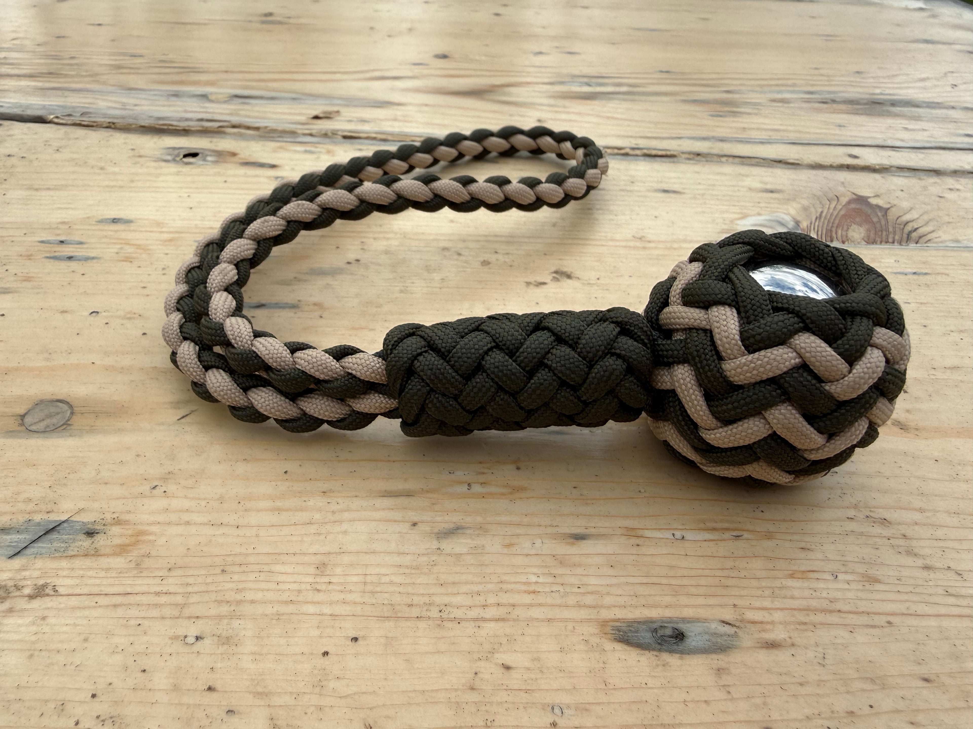 Decorative Paracord Wrapped 1.5 inch Steel Ball in OD Green and Tan monkey fist style with a handle