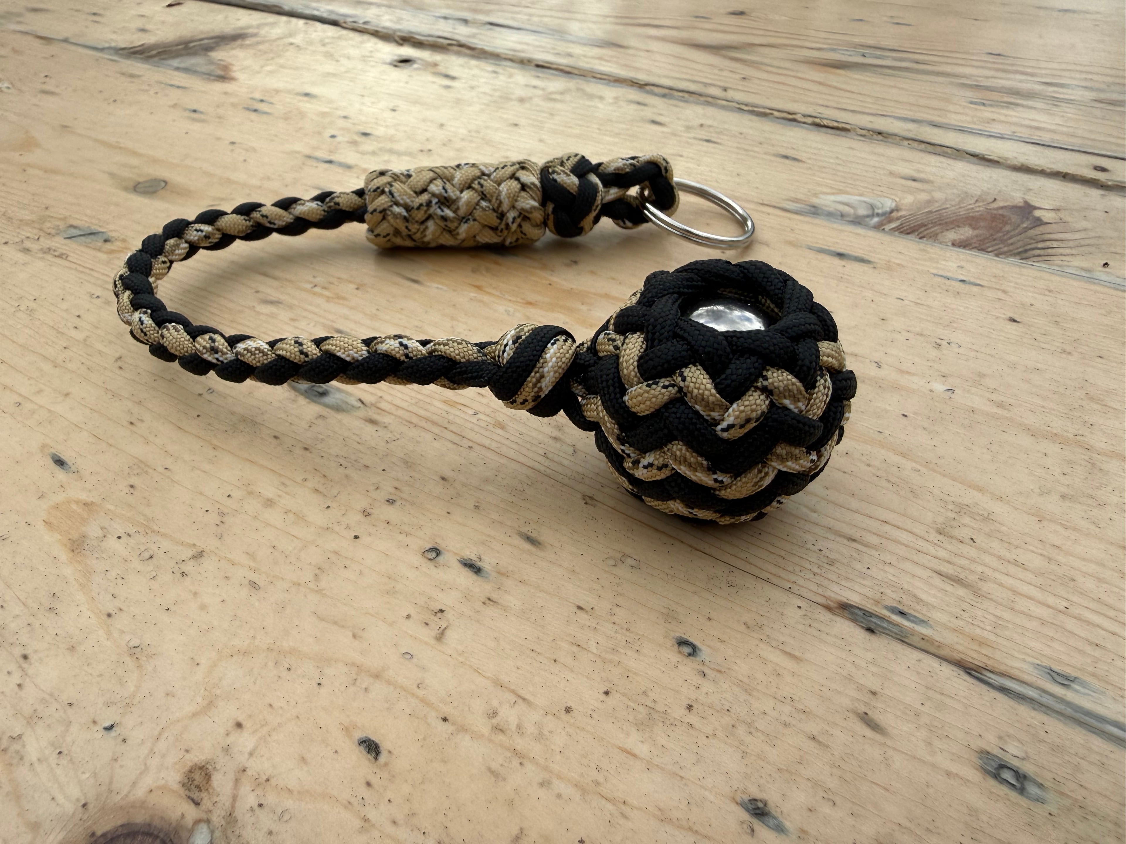 Decorative Paracord Wrapped 1.25 inch Steel Ball in Black and Tan Camo Keychain monkey fist style