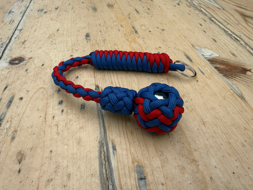 Decorative Paracord Wrapped 1 inch Steel Ball in Blue and Red Keychain monkey fist style on a split ring