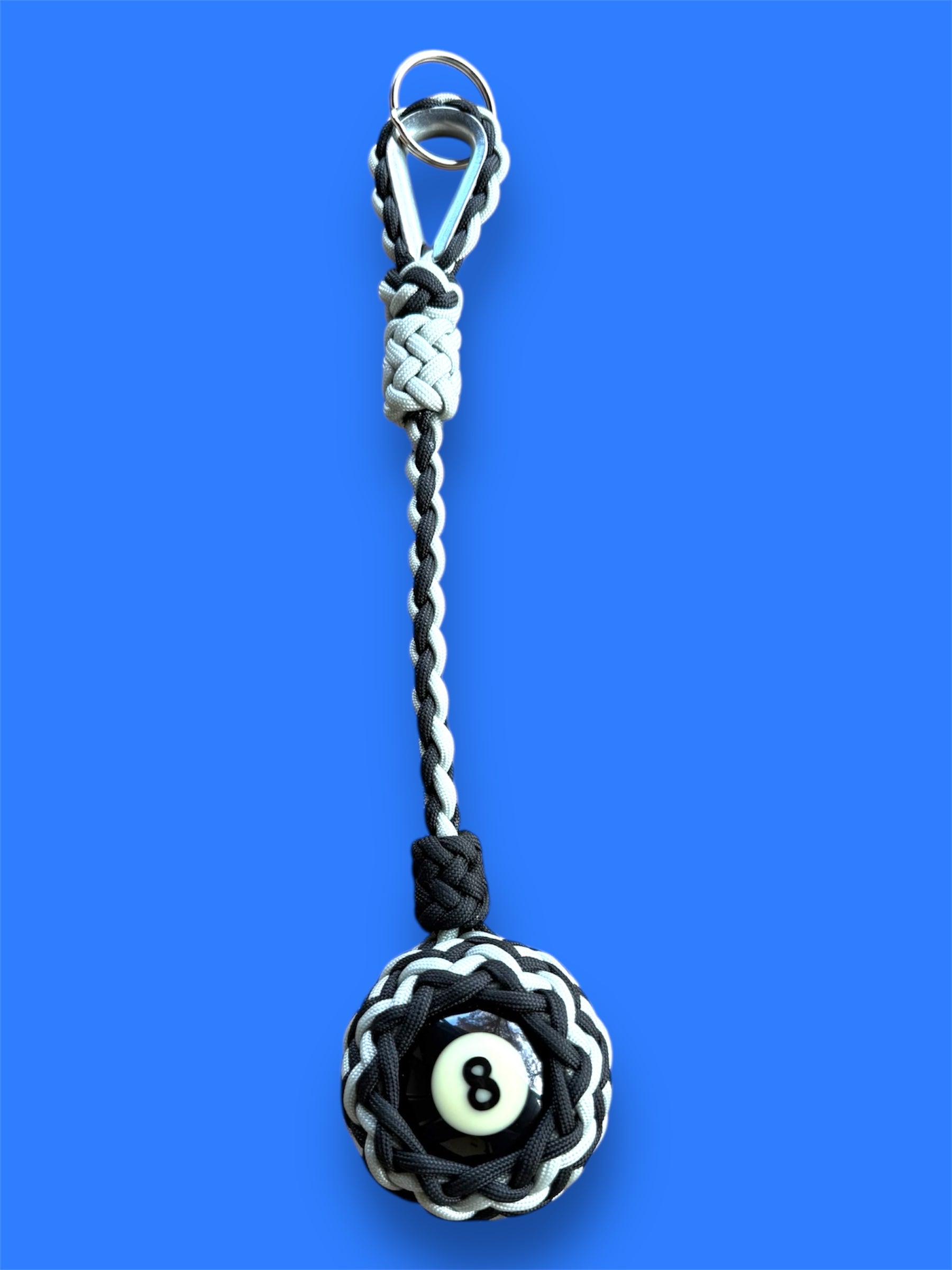 Decorative Paracord Wrapped 8 Ball in Black/Silver paracord on stainless steel thimble monkey fist style keychain