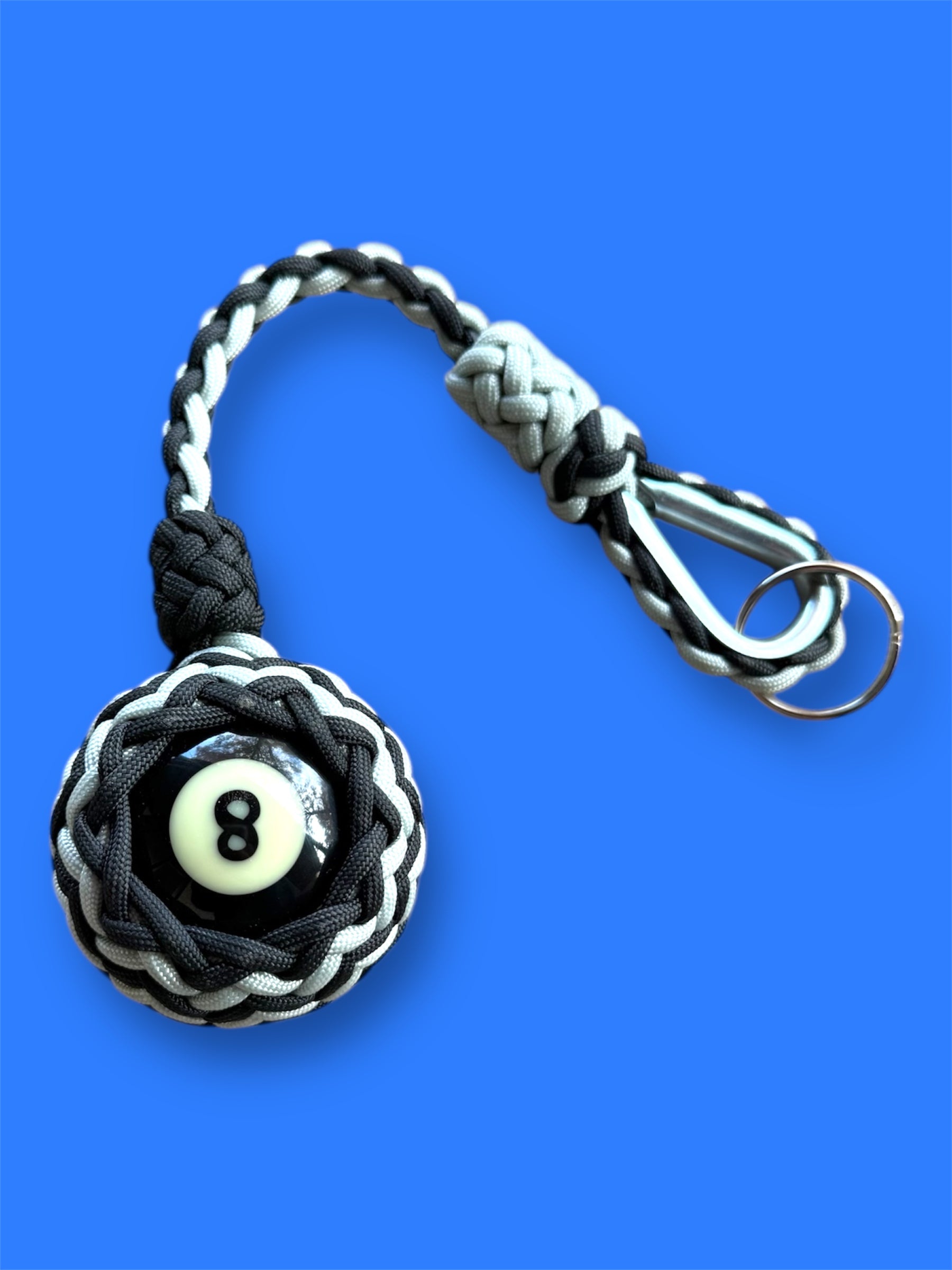 Decorative Paracord Wrapped 8 Ball in Black/Silver paracord on stainless steel thimble monkey fist style keychain