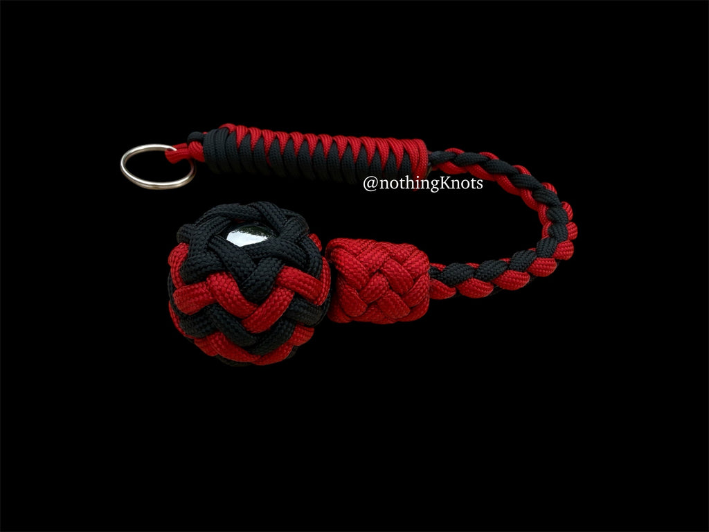 Decorative Paracord Wrapped 1 inch Steel Ball in Black and Red Keychain monkey fist style on a split ring