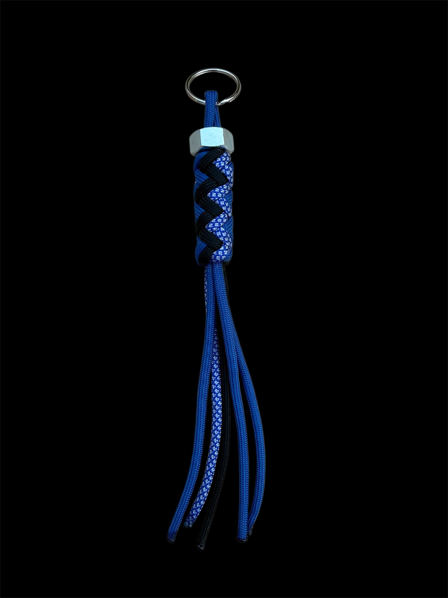 Paracord Decorative Keychain in Blue, Black, and Blue with White Diamonds on a split ring with hex nut