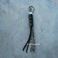 Paracord Decorative Keychain in OD Green, Black, and Camo on a split ring with hex nut