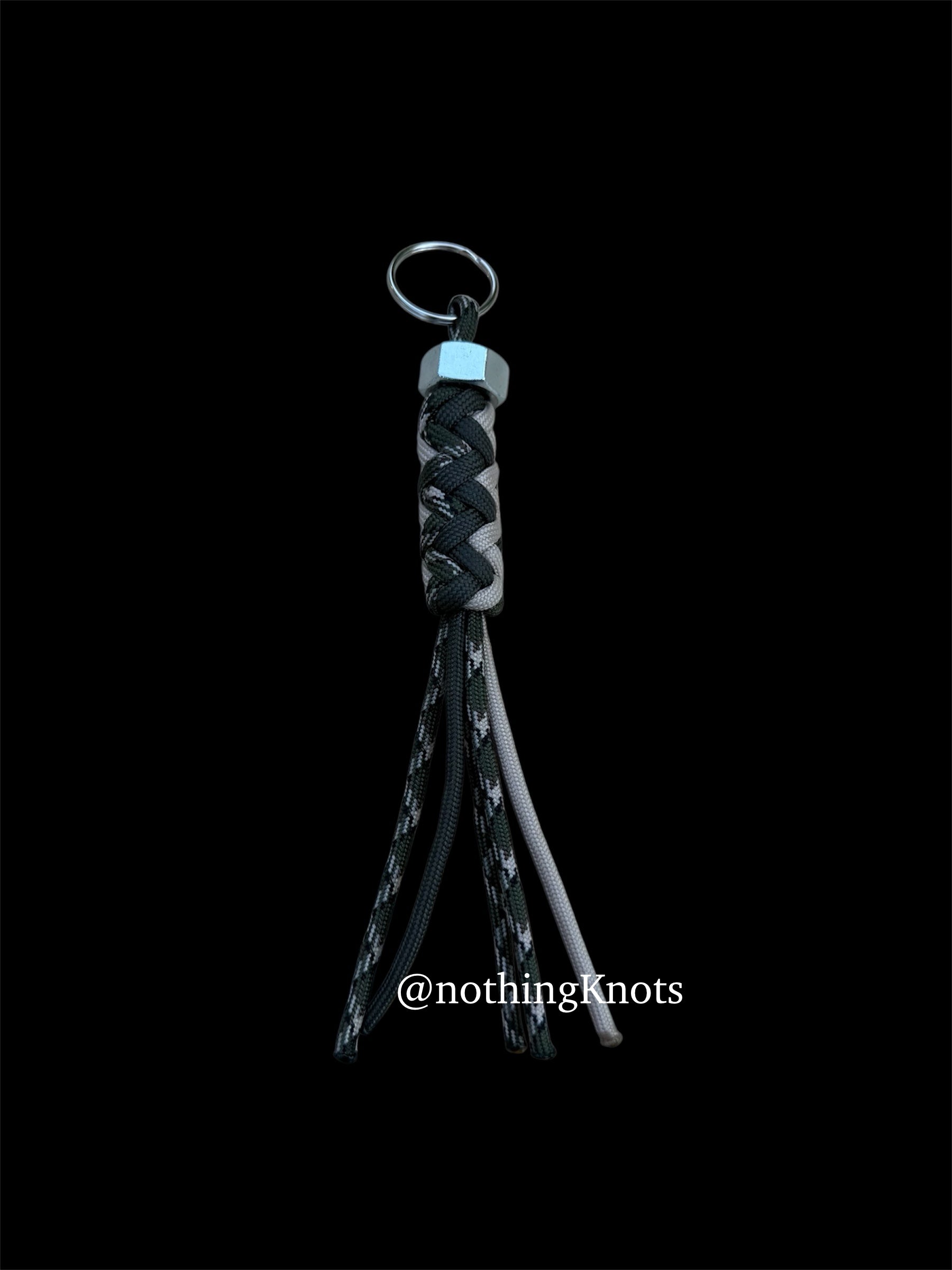 Paracord Decorative Keychain in OD Green, Tan, and Camo on a split ring with hex nut