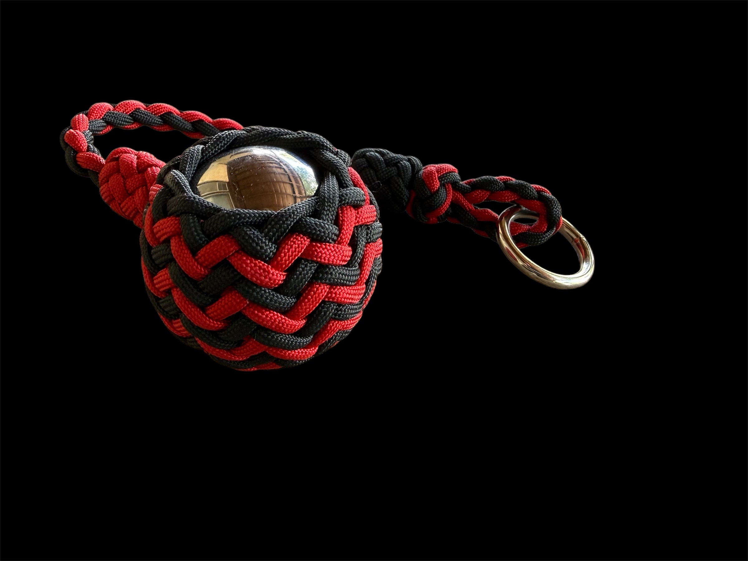 Decorative Paracord Wrapped 2 inch Steel Ball in Red and Black monkey fist style on a silver welded O ring