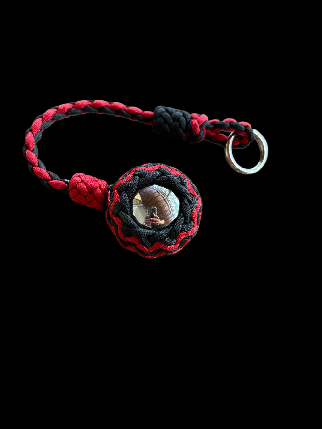 Decorative Paracord Wrapped 2 inch Steel Ball in Red and Black monkey fist style on a silver welded O ring