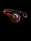 Decorative Paracord Wrapped 2 inch Steel Ball in Red and Black monkey fist style on a silver welded O ring