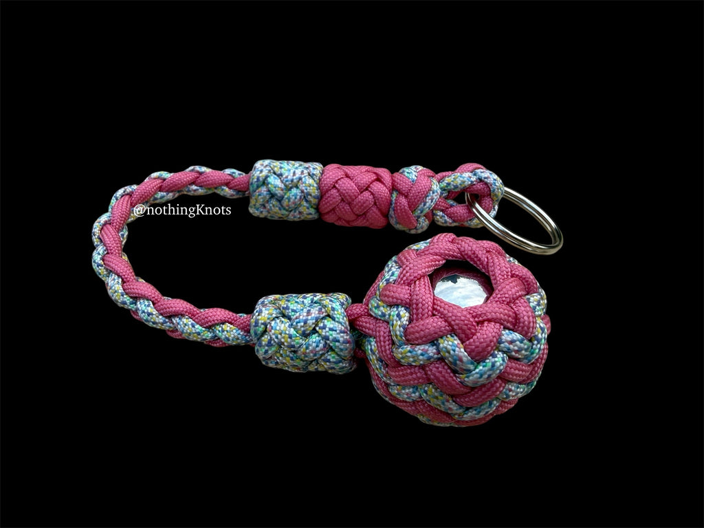 Decorative Paracord Wrapped 1.25 inch steel ball with Rose Pink and Pastel Speckles
