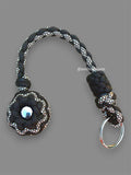 Decorative Paracord Wrapped 1.25 inch Steel Ball in Dark Brown and White with Brown Diamonds Keychain