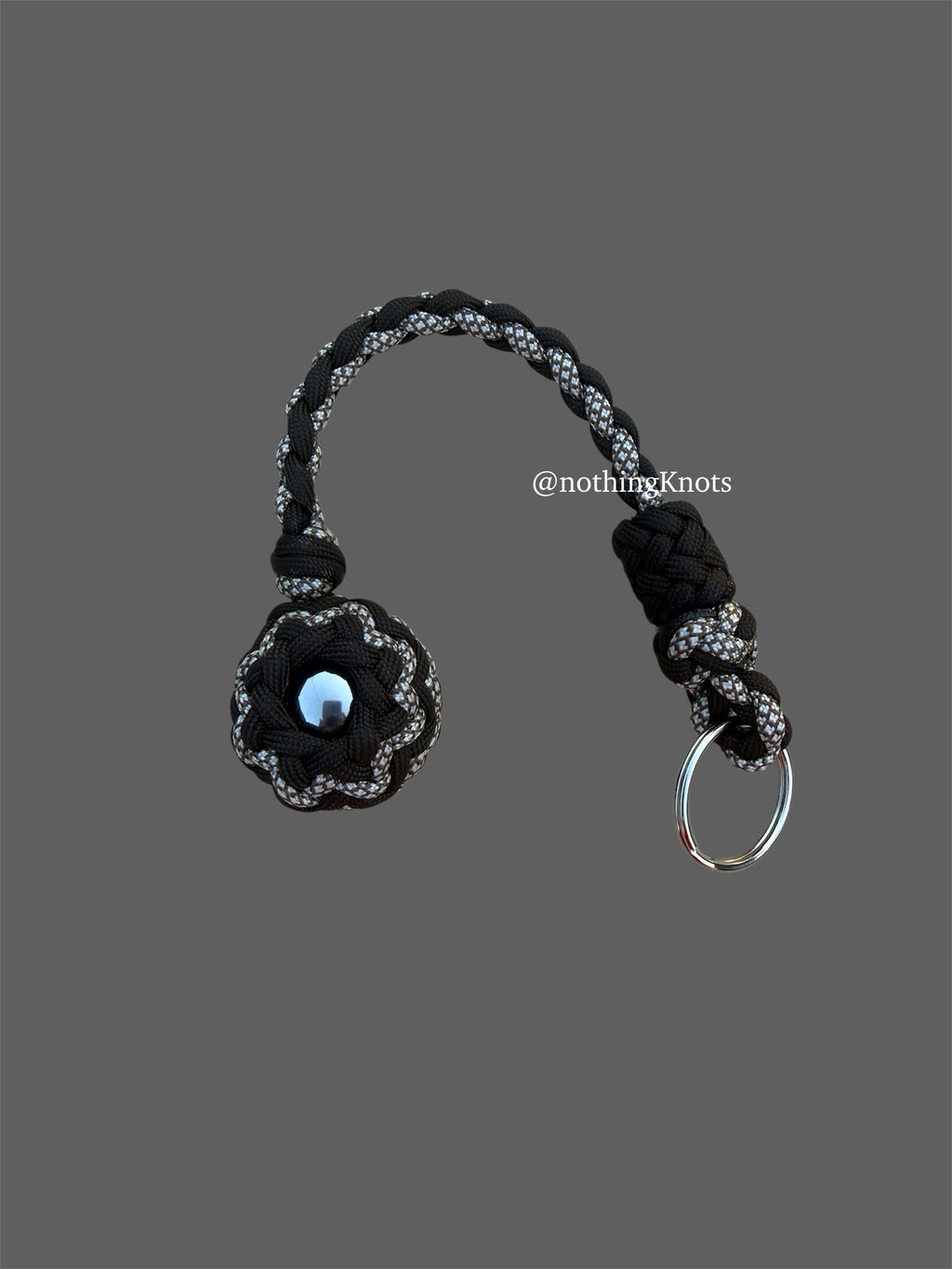 Decorative Paracord Wrapped 1.25 inch Steel Ball in Dark Brown and White with Brown Diamonds Keychain
