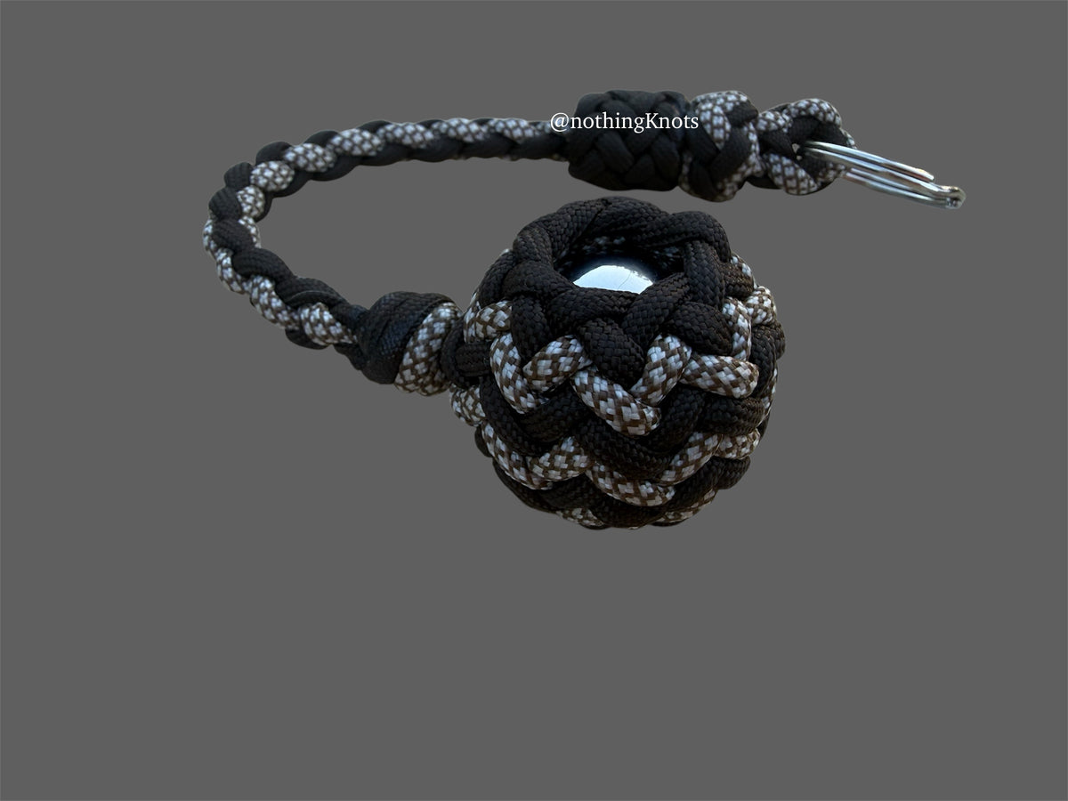 Decorative Paracord Wrapped 1.25 inch Steel Ball in Dark Brown and White with Brown Diamonds Keychain