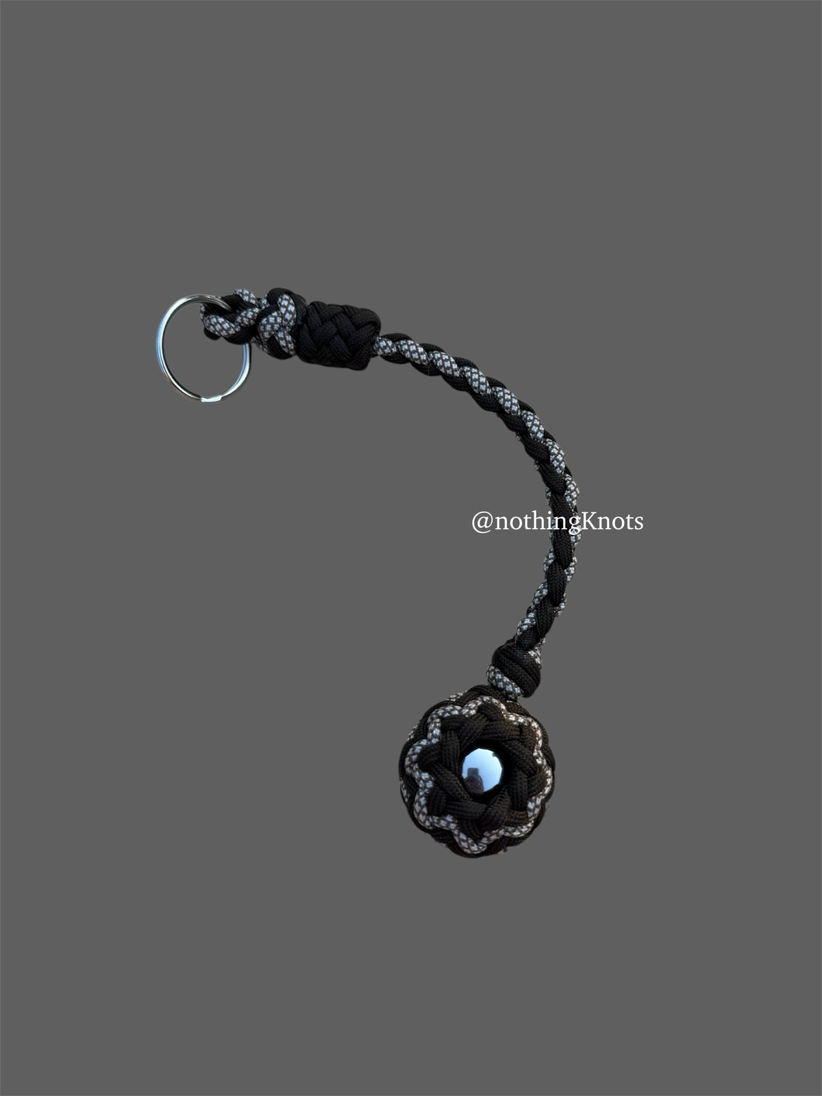 Decorative Paracord Wrapped 1.25 inch Steel Ball in Dark Brown and White with Brown Diamonds Keychain