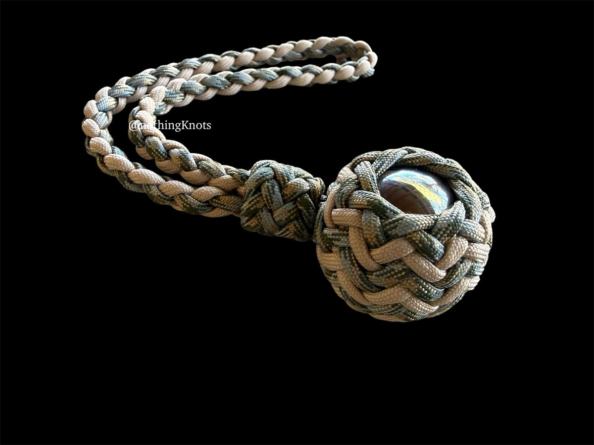 Decorative Paracord Wrapped 1.5 inch Steel Ball in Tan and ACU Camo monkey fist style with a handle